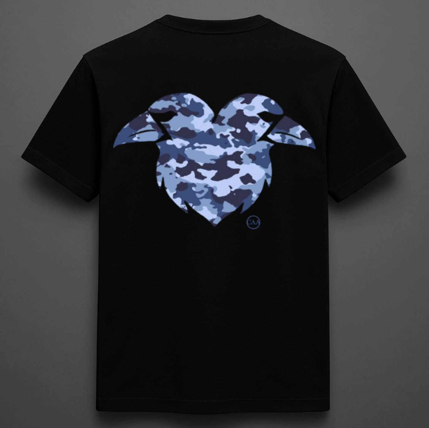 Black t-shirt with blue camouflage heart design on a gray background